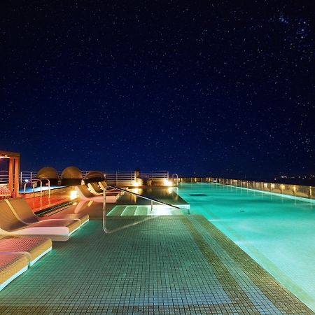 Kensington Jeju Hotel Exterior foto Rooftop pool at the hotel